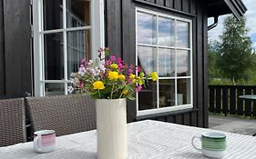 Koselig hytte - Trysilfjellet nært til sykkel- og turstier - 4 soverom, 2 bad, badstue, fiber bredbånd og Elbillader
